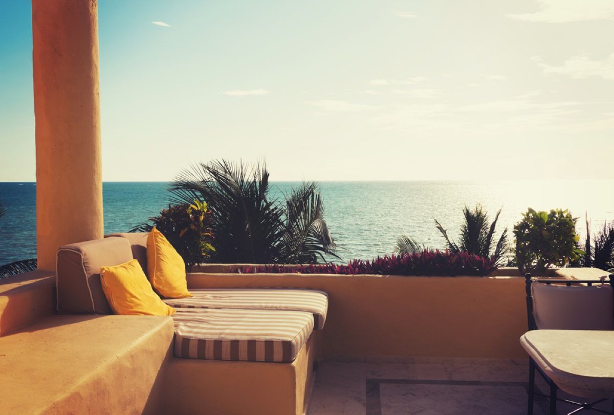 There Is A View Of The Ocean From A Balcony — Ocean Charm Upholstery In Southport, QLD