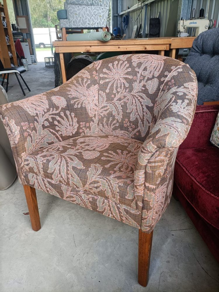 A Chair With A Floral Pattern Is Sitting In A Room — Ocean Charm Upholstery In Southport, QLD