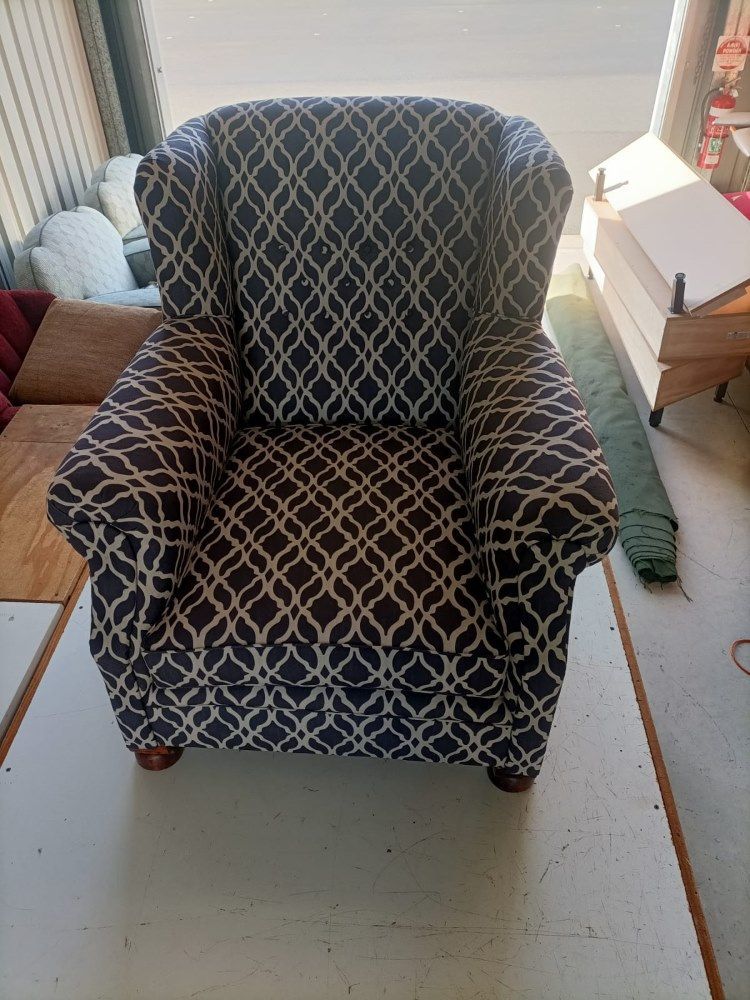 A Chair With A Pattern On It Is Sitting On A Table — Ocean Charm Upholstery In Southport, QLD