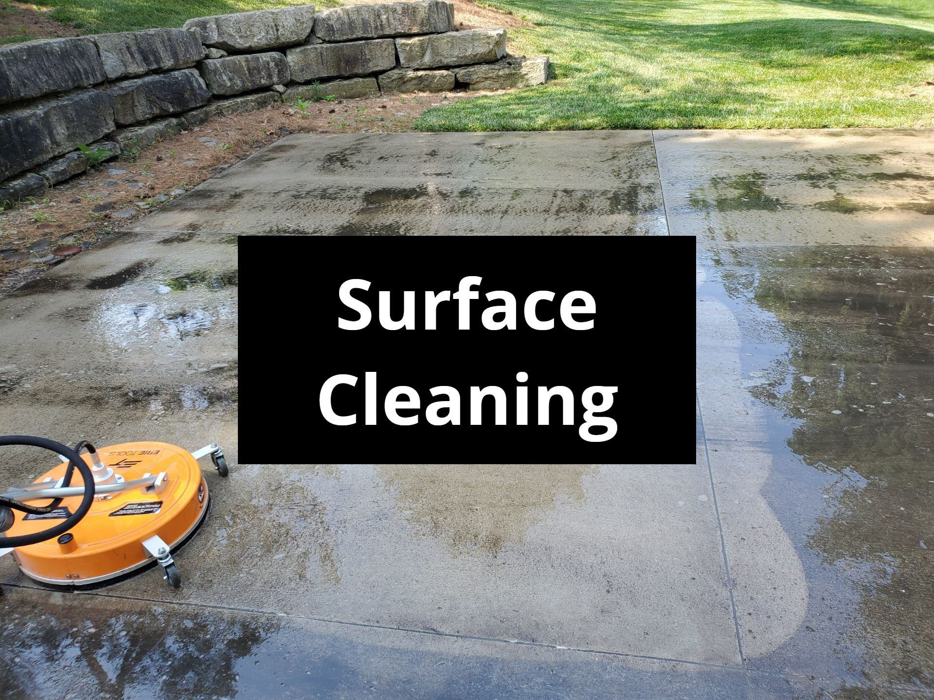 Surface cleaner removing dirt from a concrete patio.