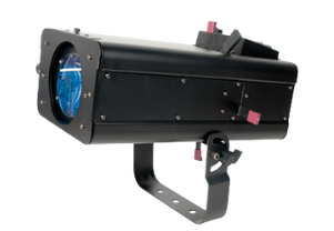 Black stage spotlight with blue light emitting from its lens.