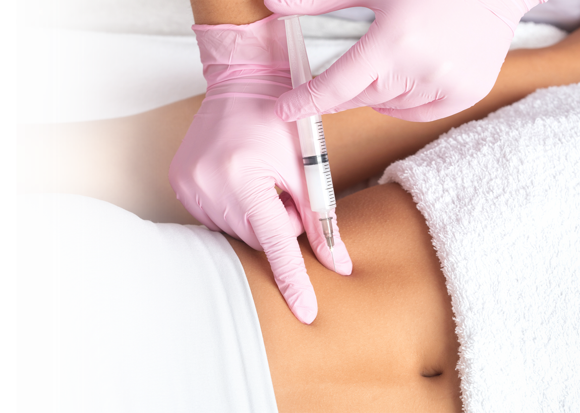 A woman is getting an injection in her stomach.
