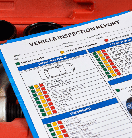 Vehicle inspection report showing checks for brakes, lights, fluids, tires, and other components.