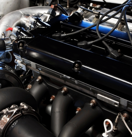 Close-up of a modified high-performance engine with upgraded components.