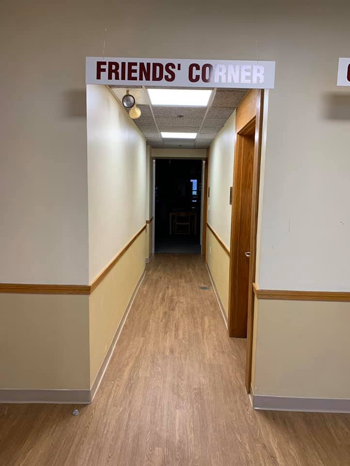 A hallway entrance labeled 