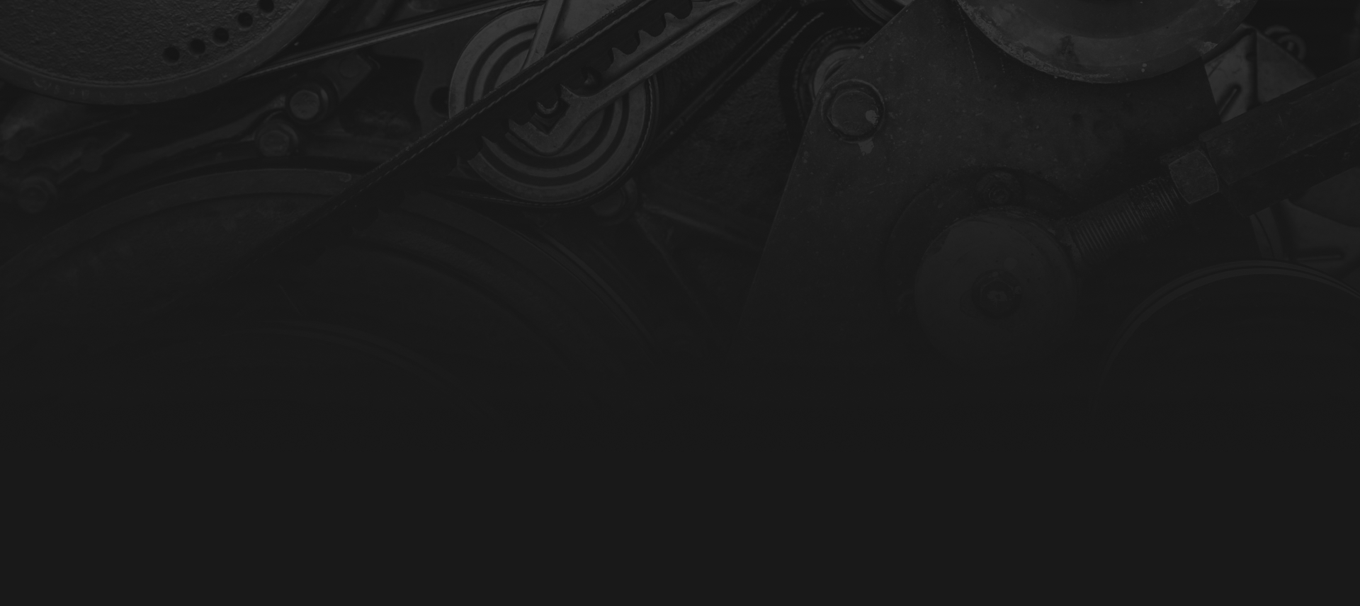 Background of engine parts and black background overlay | Monroe Goodyear