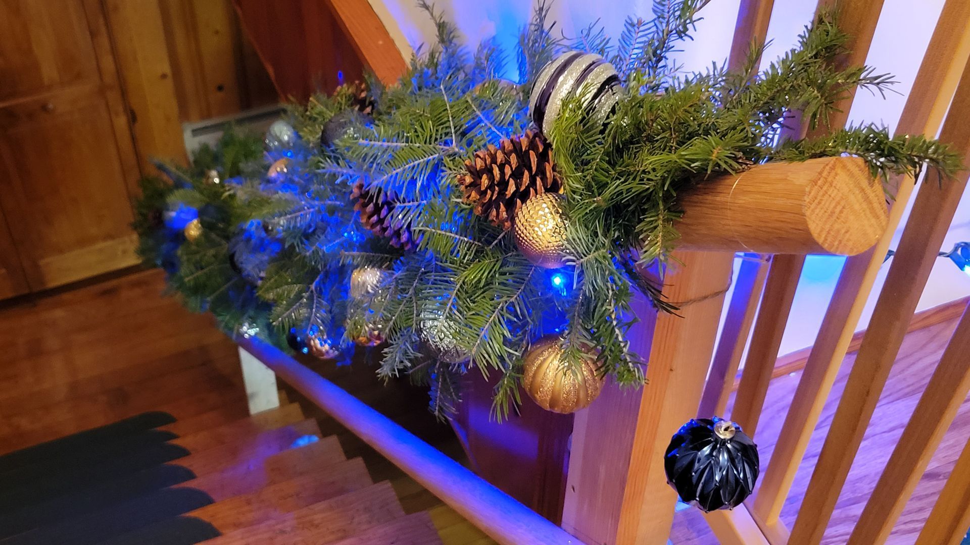 A holiday garland, handmade by Rebekkah of Ostara's Grove Flower Farm