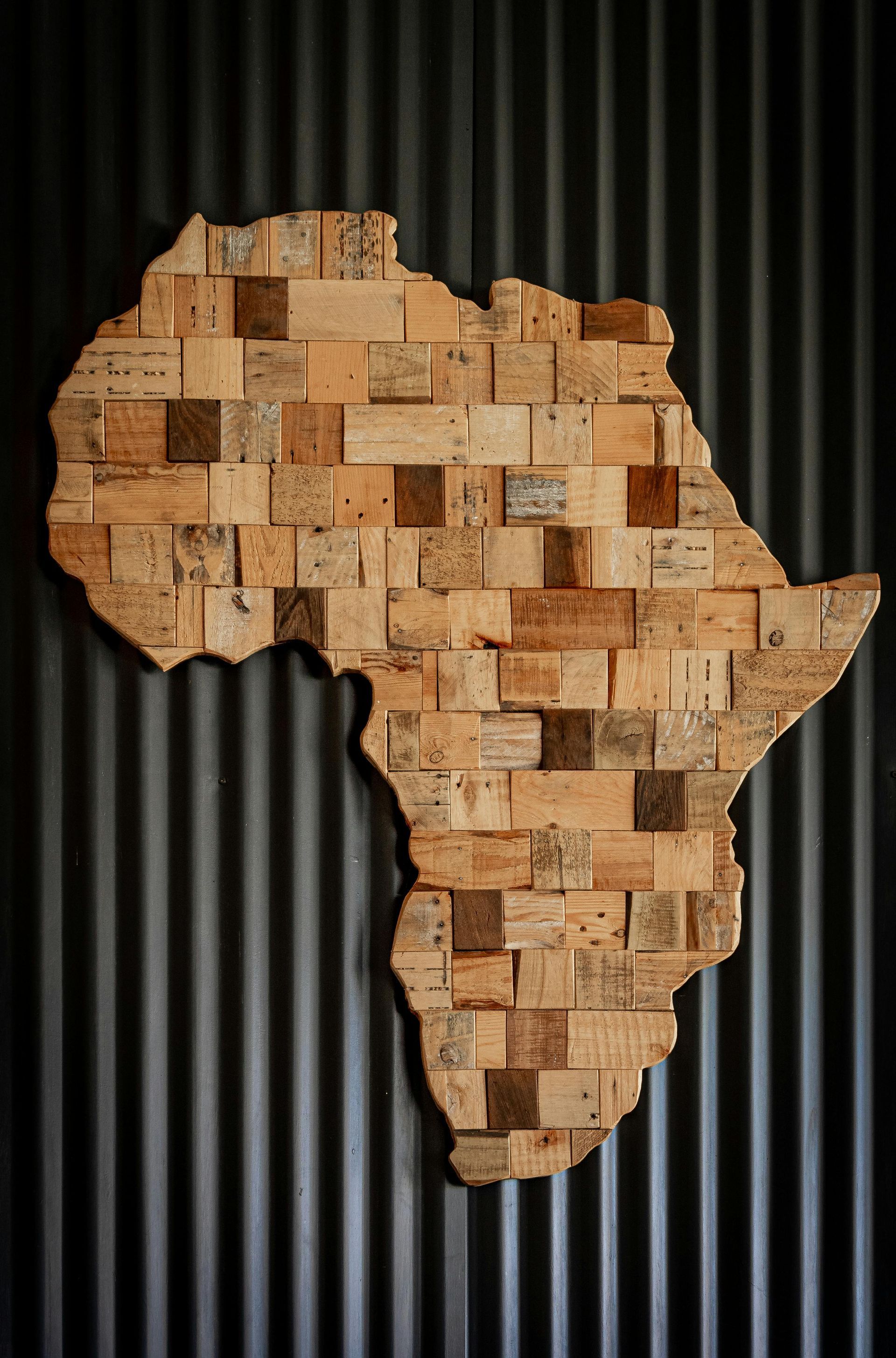 Wooden African continent carving