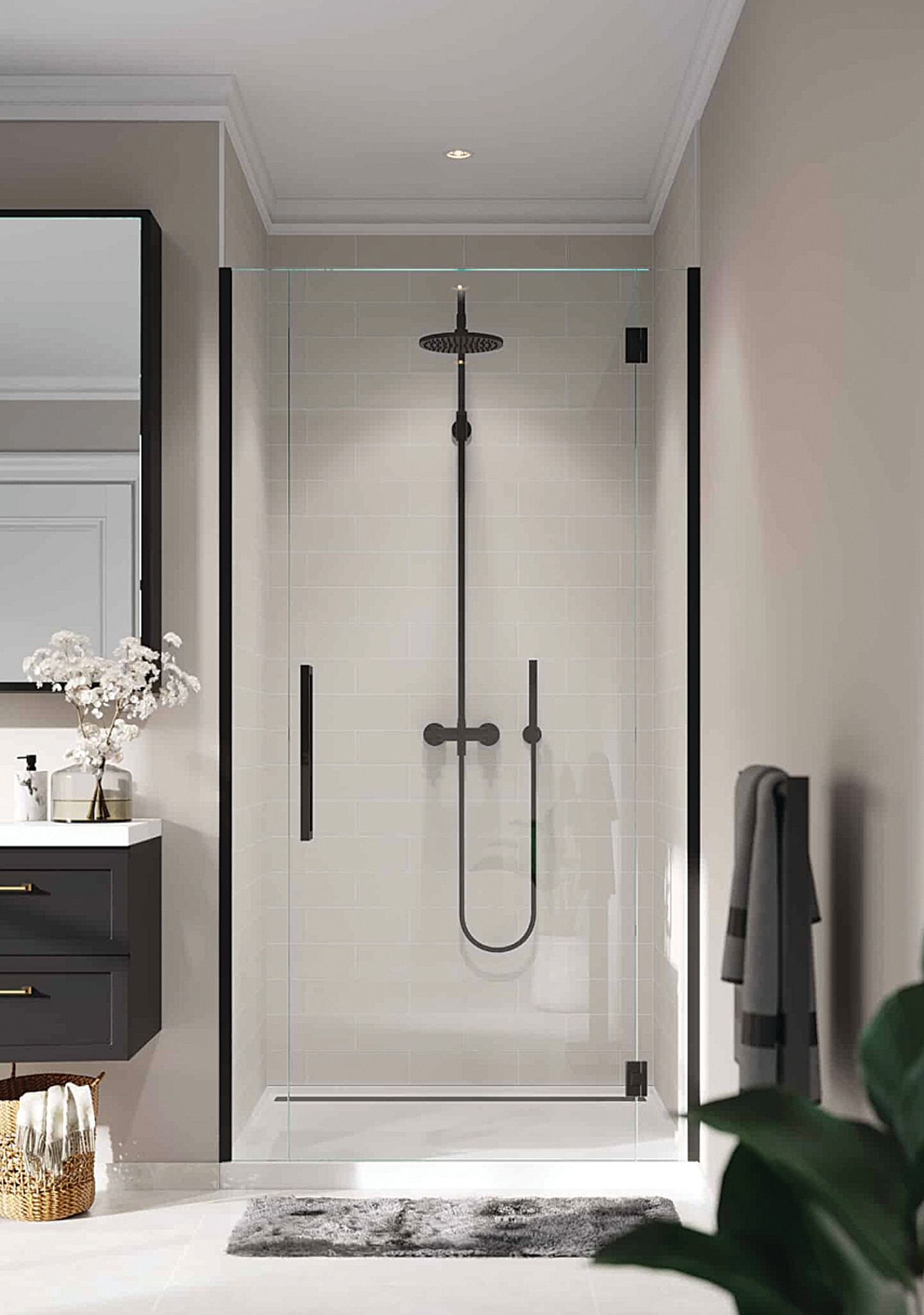 A modern glass shower enclosure with matte black hardware, centered in a neutral-toned bathroom.