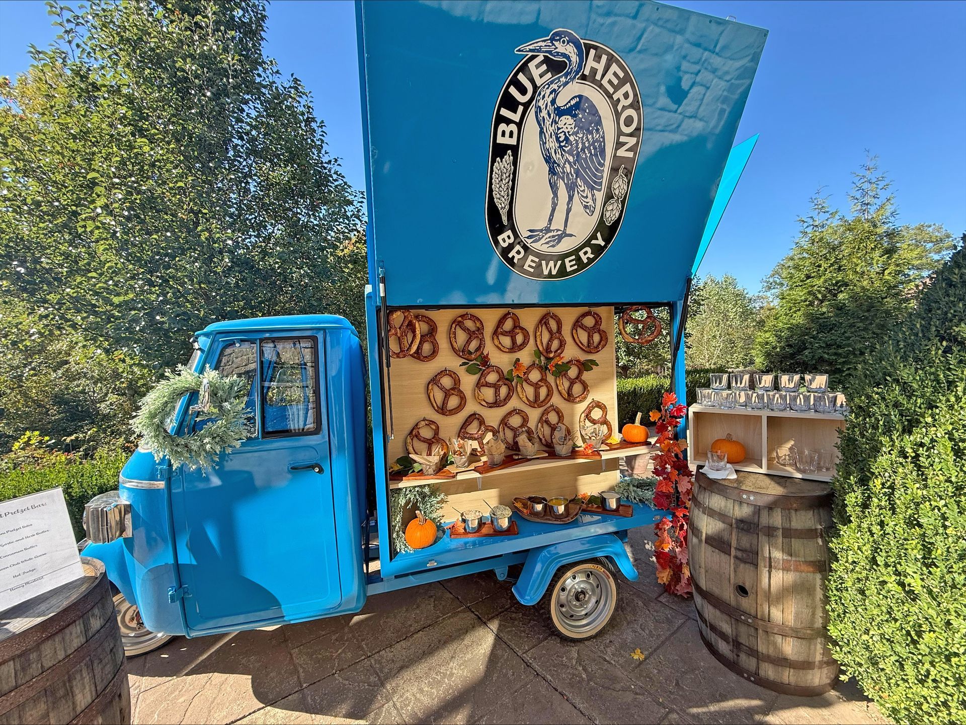 A blue mobile vending truck branded