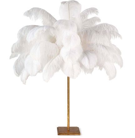 A white ostrich feather floor lamp with a thin gold-colored stand and a square base.
