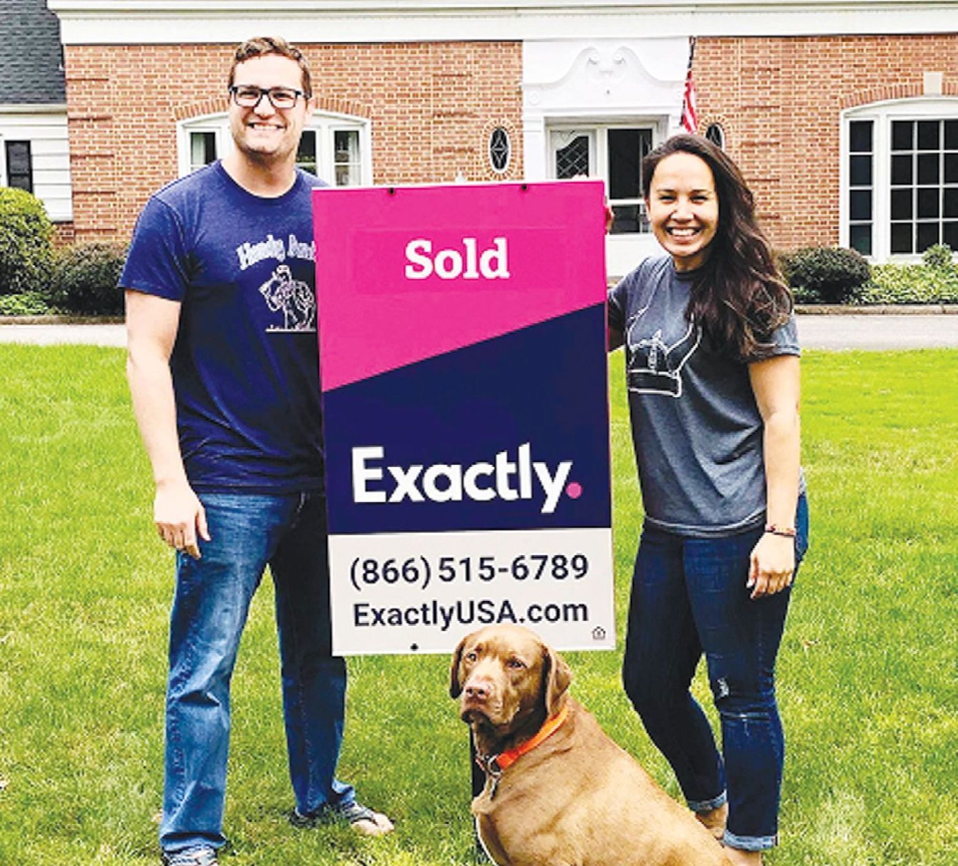 A man and woman smiling in front of a house, holding a