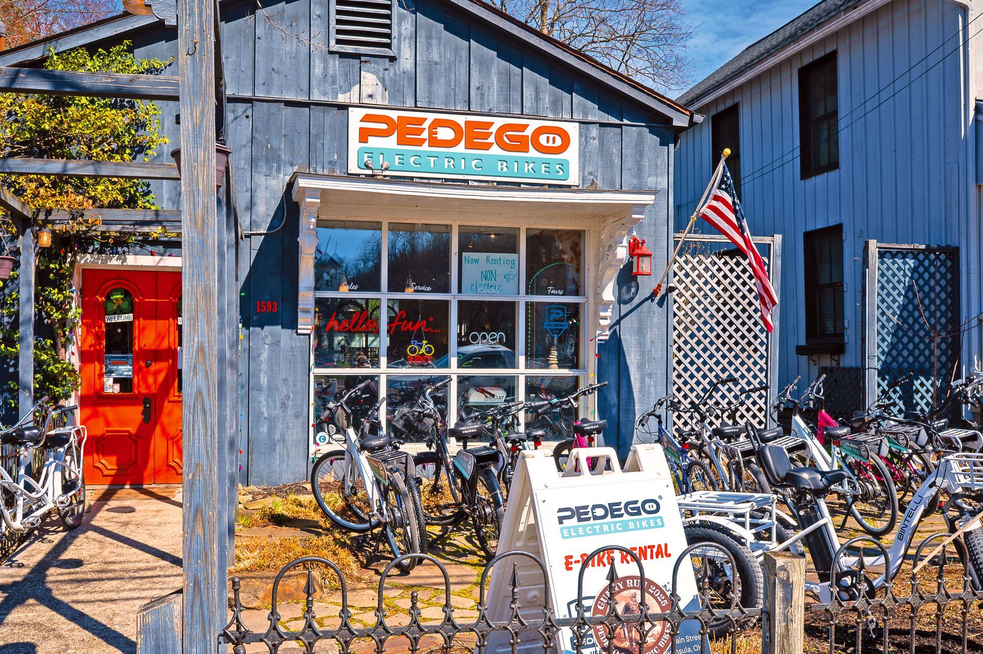 A large, weathered, vintage-style metal sign reading