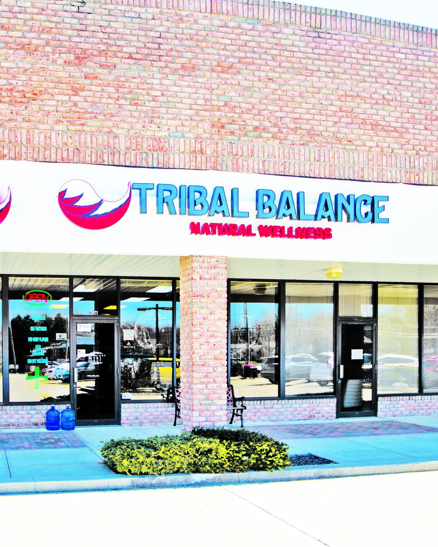 A brick-front storefront with the sign 