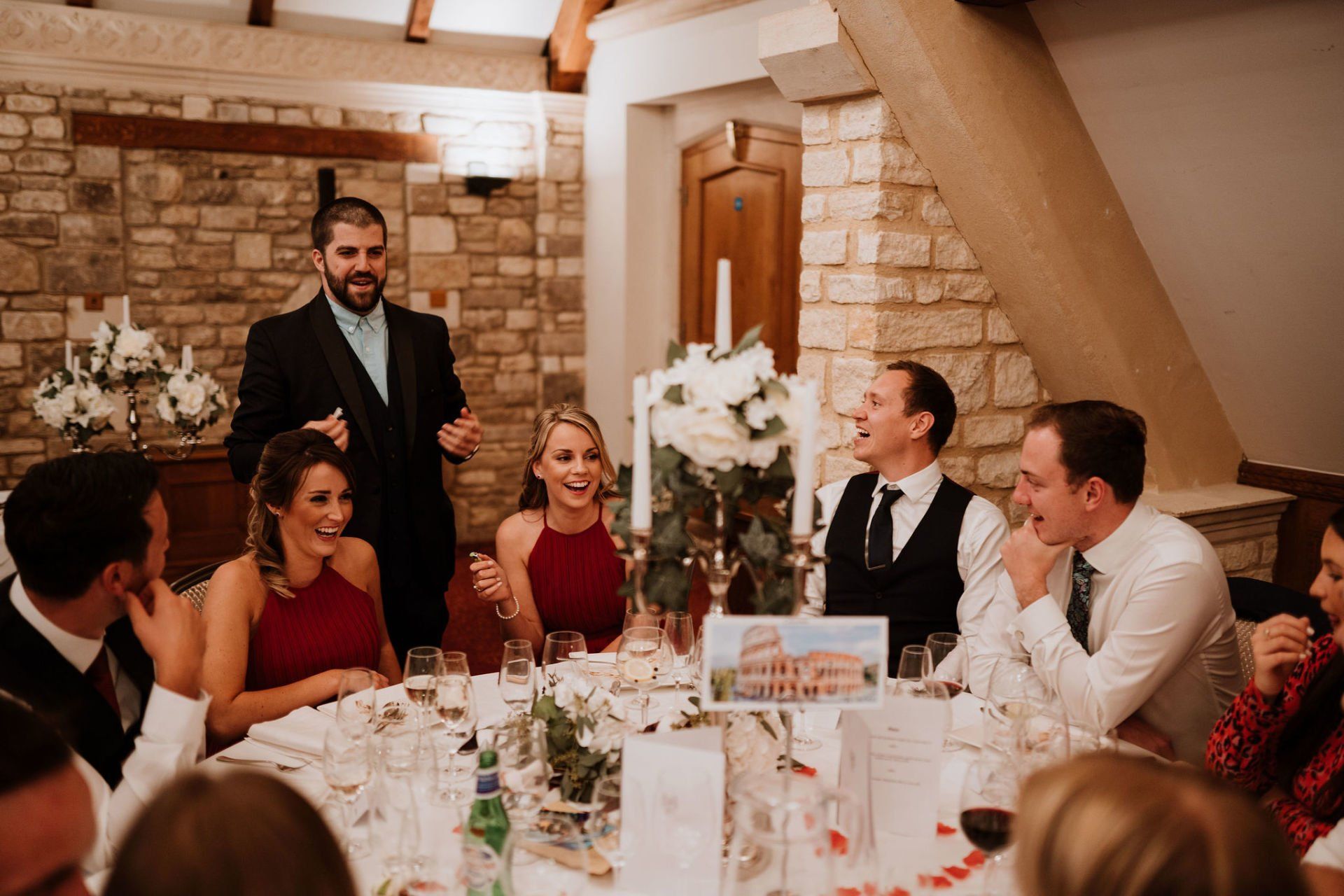 Wedding magician Daniel Chard performing table magic for guests during a wedding breakfast