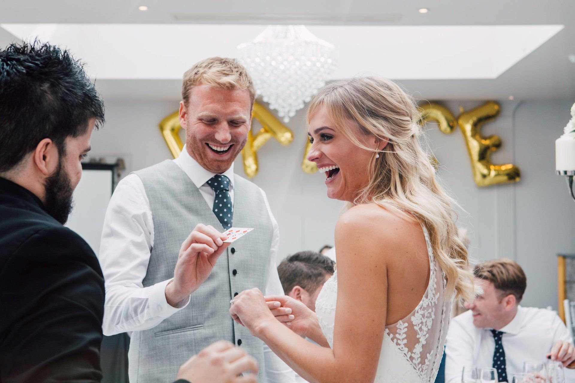 Daniel Chard performing close-up magic for wedding guests in Bristol