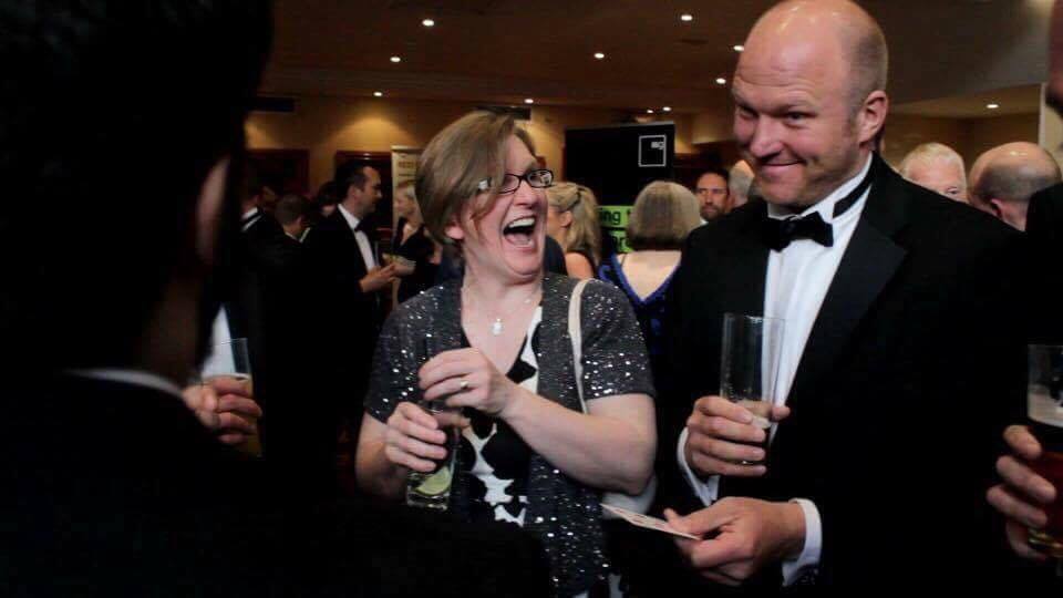 Corporate magician Daniel Chard performing close-up magic at a networking event