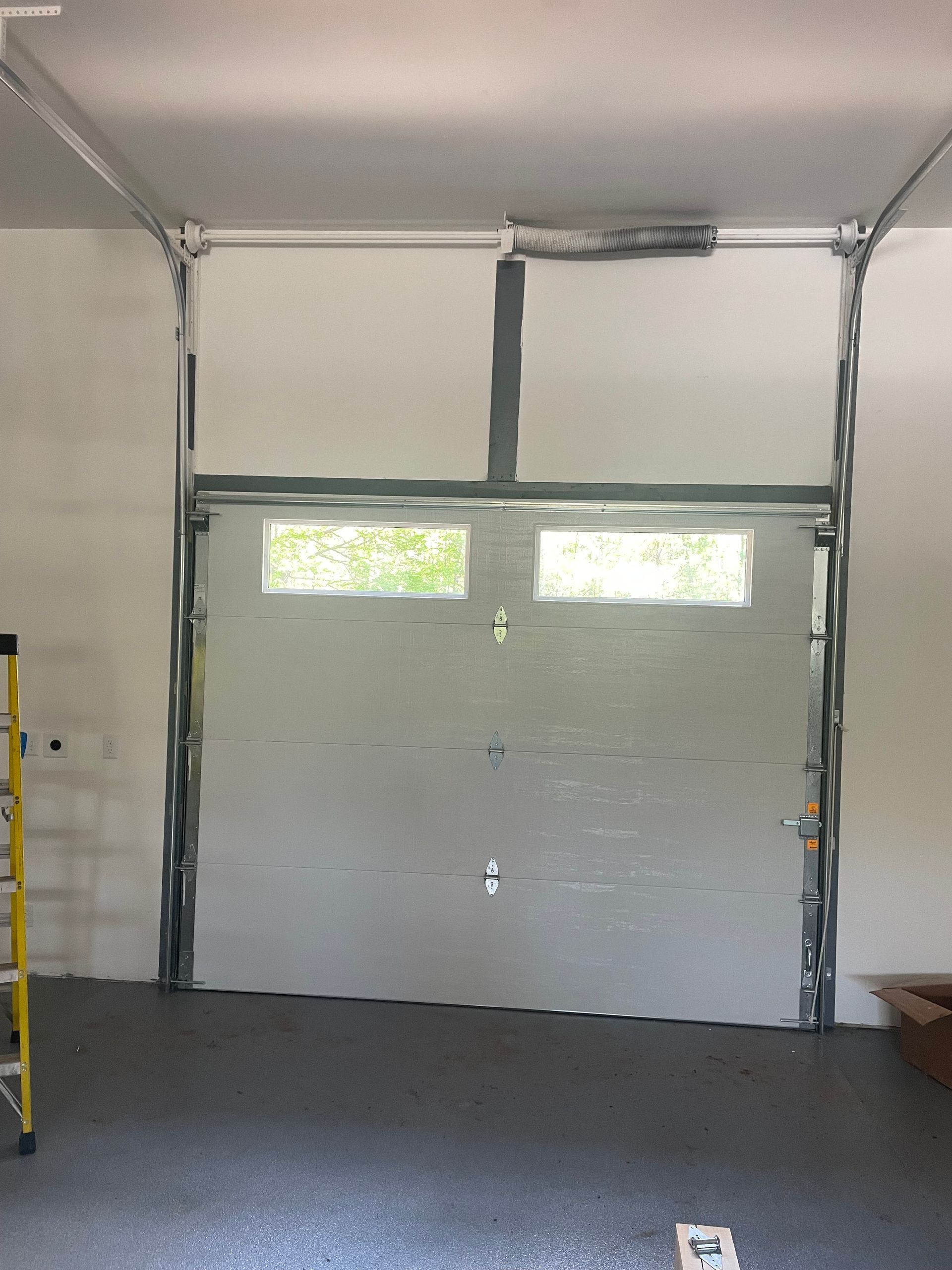 Steel Garage Door Installation — American Overhead Door