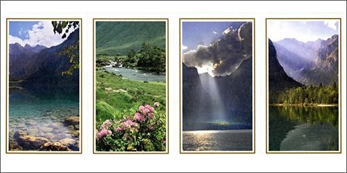 Four framed landscape photos of mountains, lake, flowers, sunlight, and a forested valley