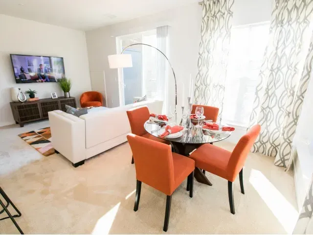 Dining room and living area at Overlook at Franklin Square apartments in Baltimore, MD.