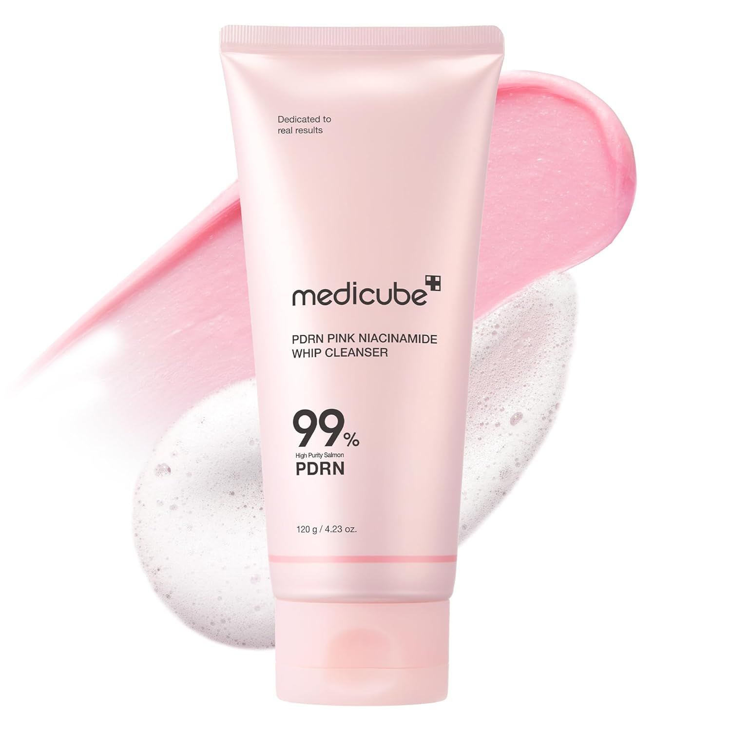 Pink Medicube cleanser tube with pink and white swashes of product on white background.