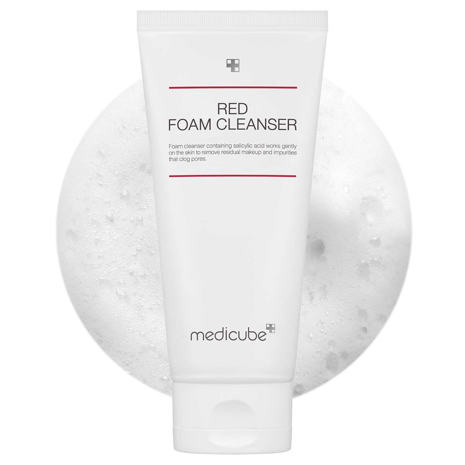 White tube of Medicube Red Foam Cleanser with foam in the background.