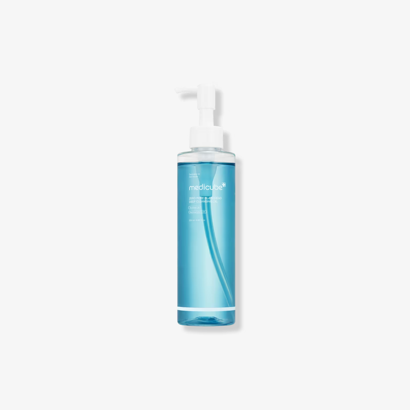 Blue cleansing oil bottle with a pump on a white background.