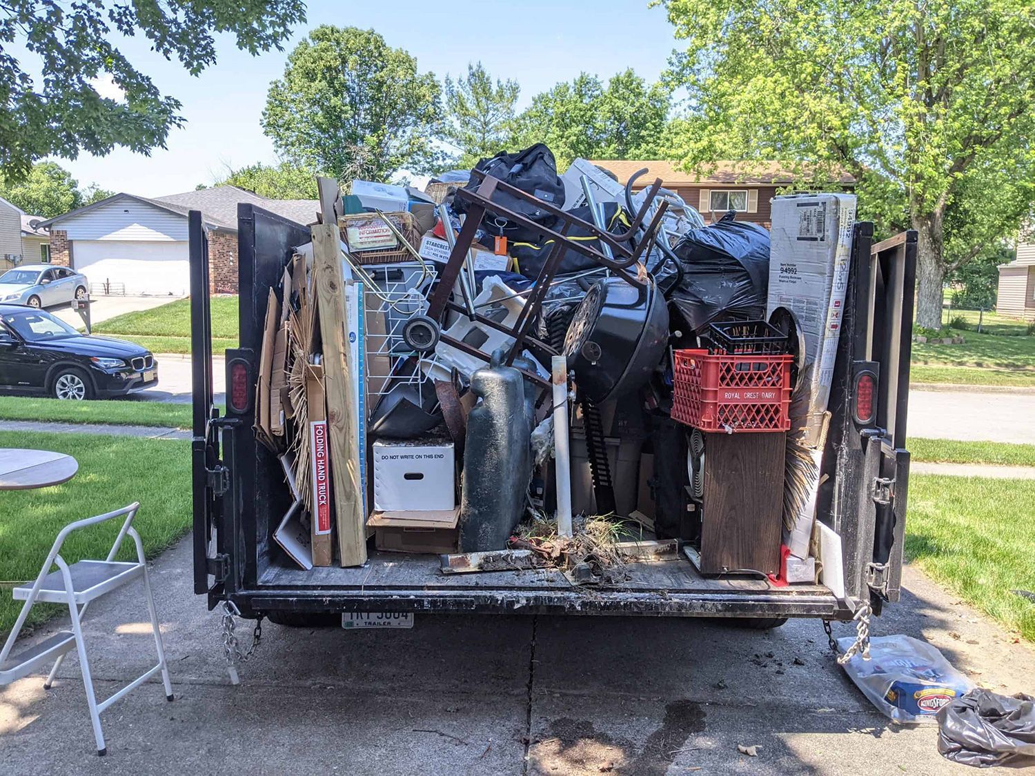 Stache trailer full of junk, junk removal