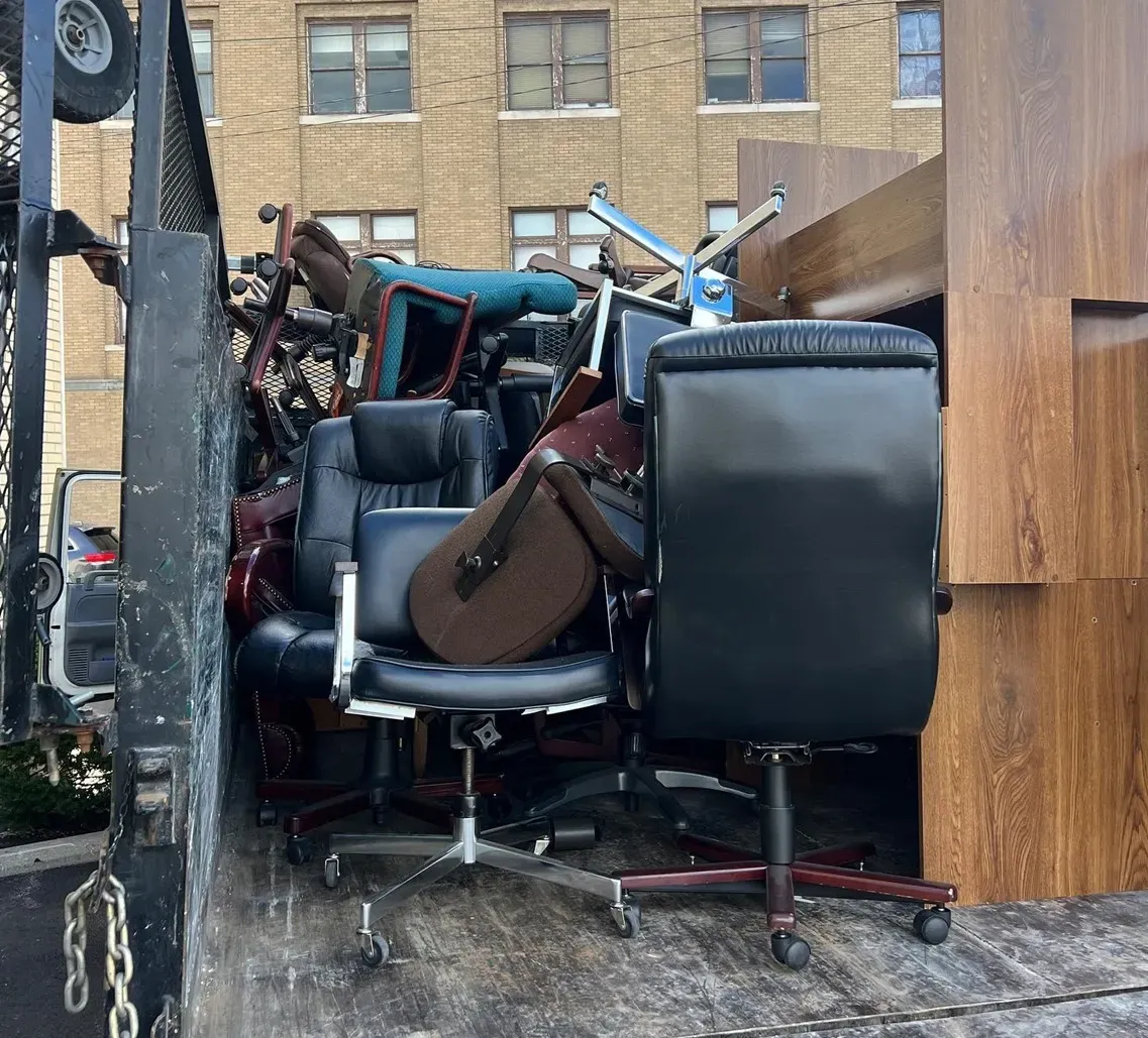 office chairs and other furniture in trailer, commercial furniture removal services in central oh