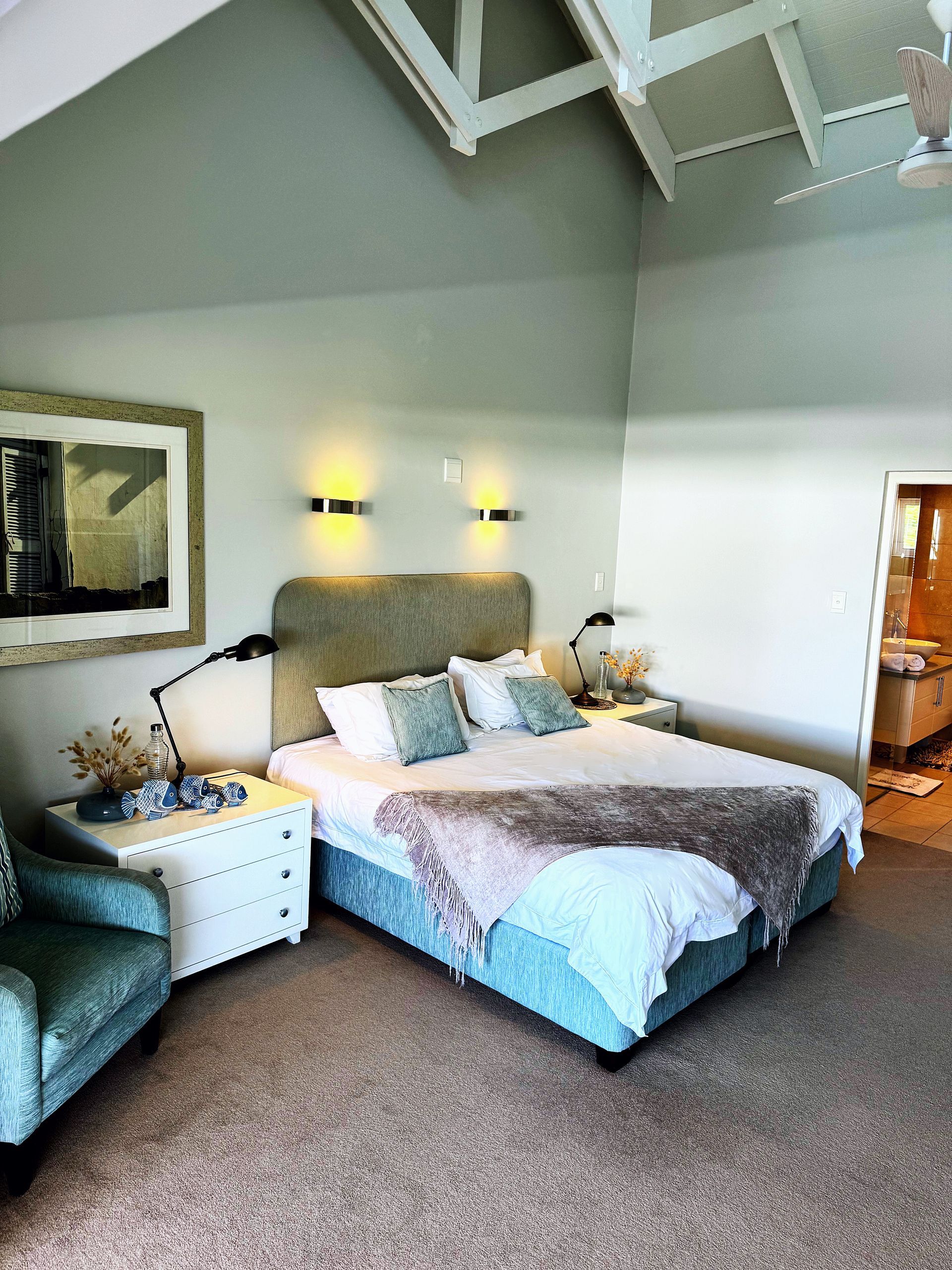 There is a large bed in the middle of the room.