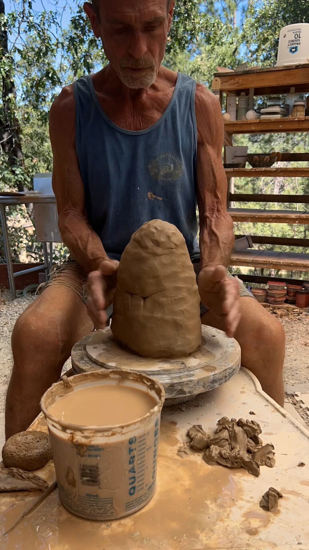 Reading the clay for centering of the 20 pound half's of the rain catchers