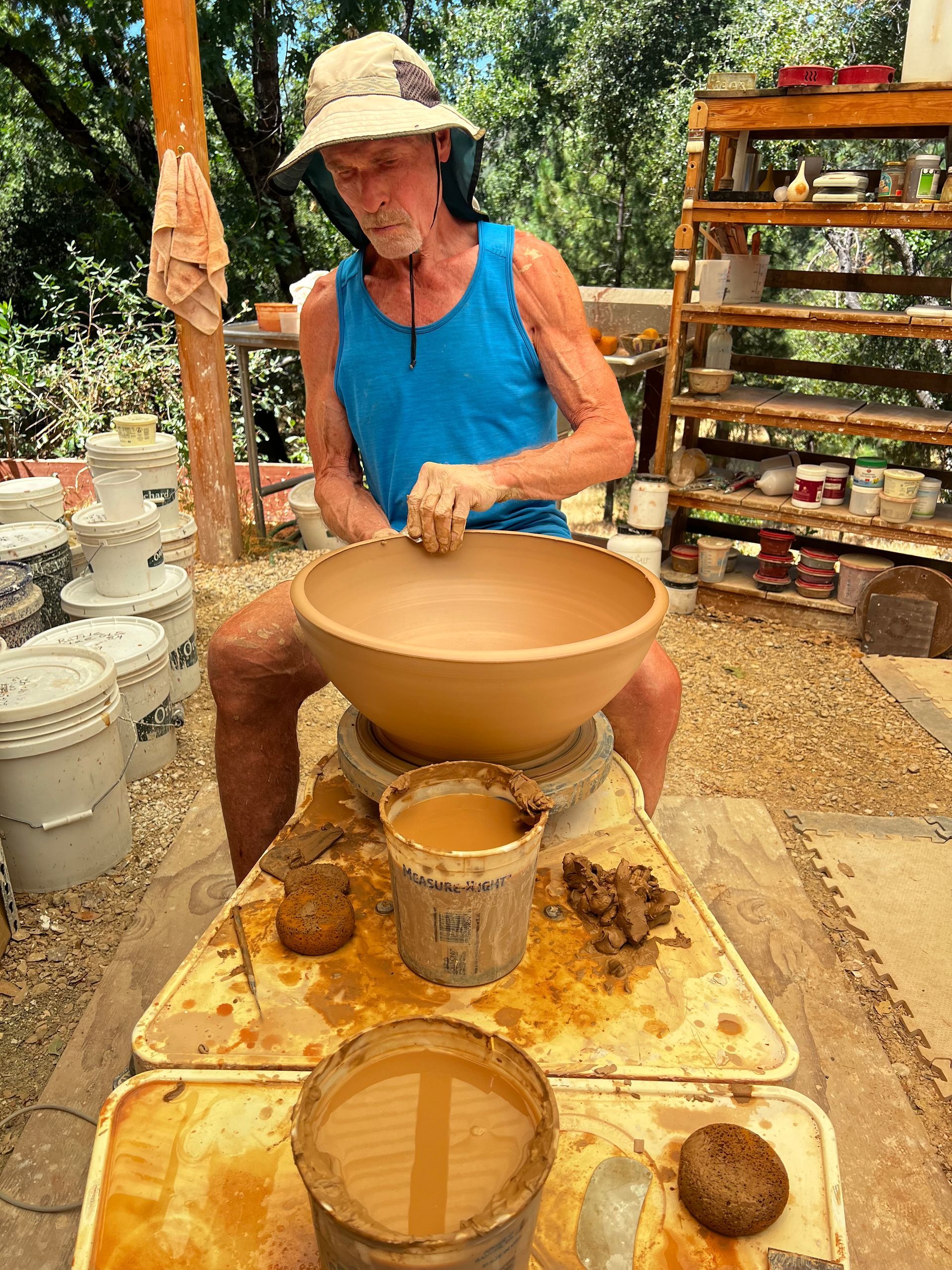 Bill Mansperger finishing up on a potters wheel throwing a 20 pound mixing bowl