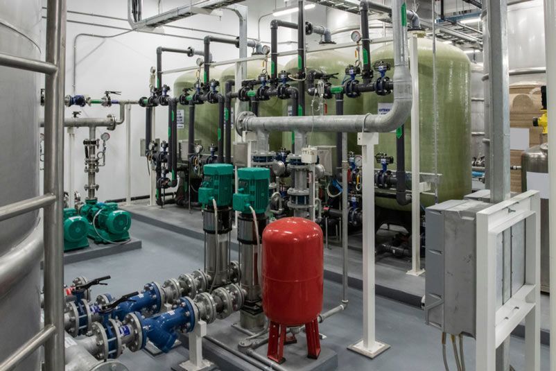 Professionally Installed Water Tanks in Commercial Building — Commercial Plumbing in Wollongong