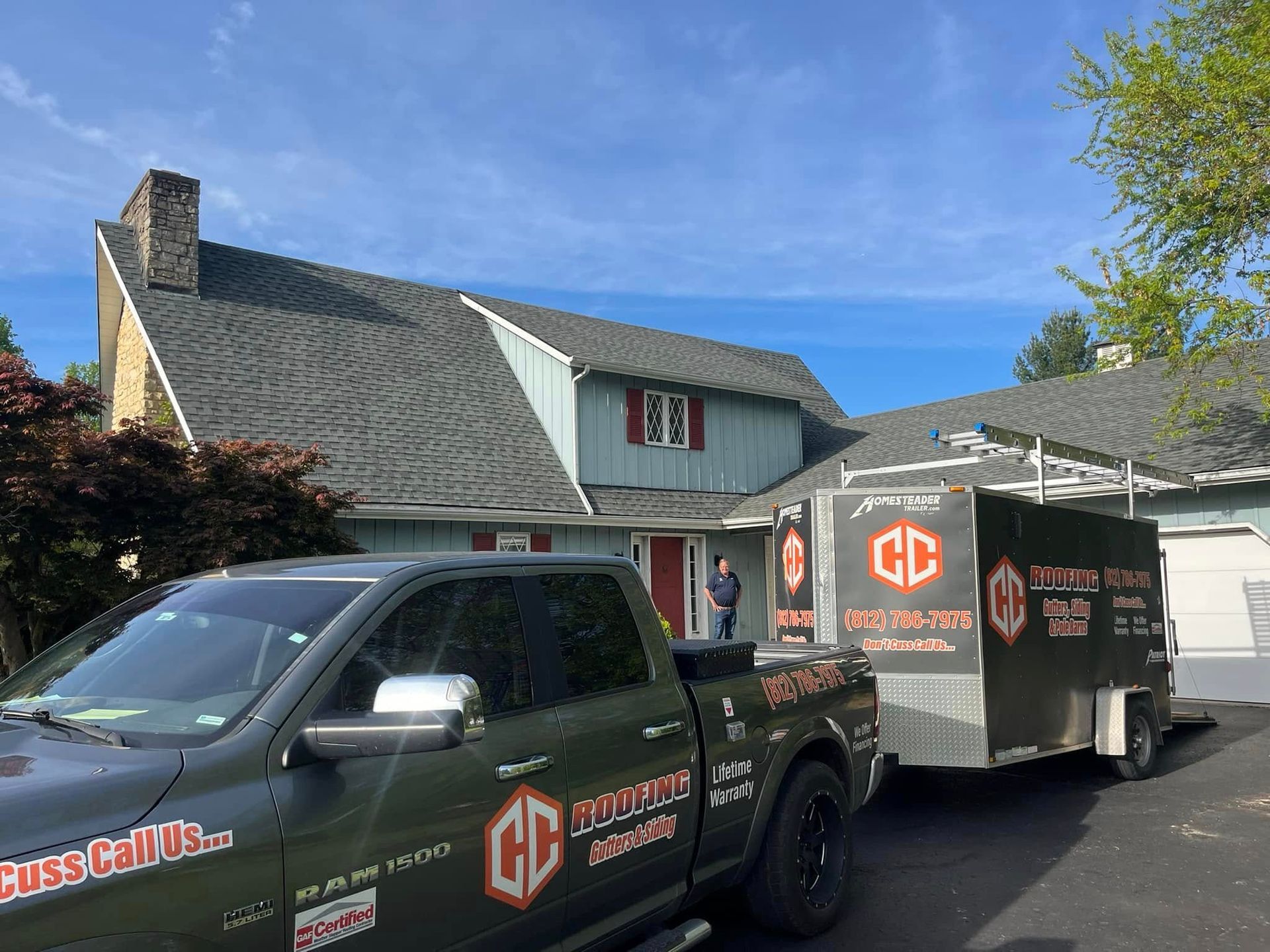 A dark gray service truck with 