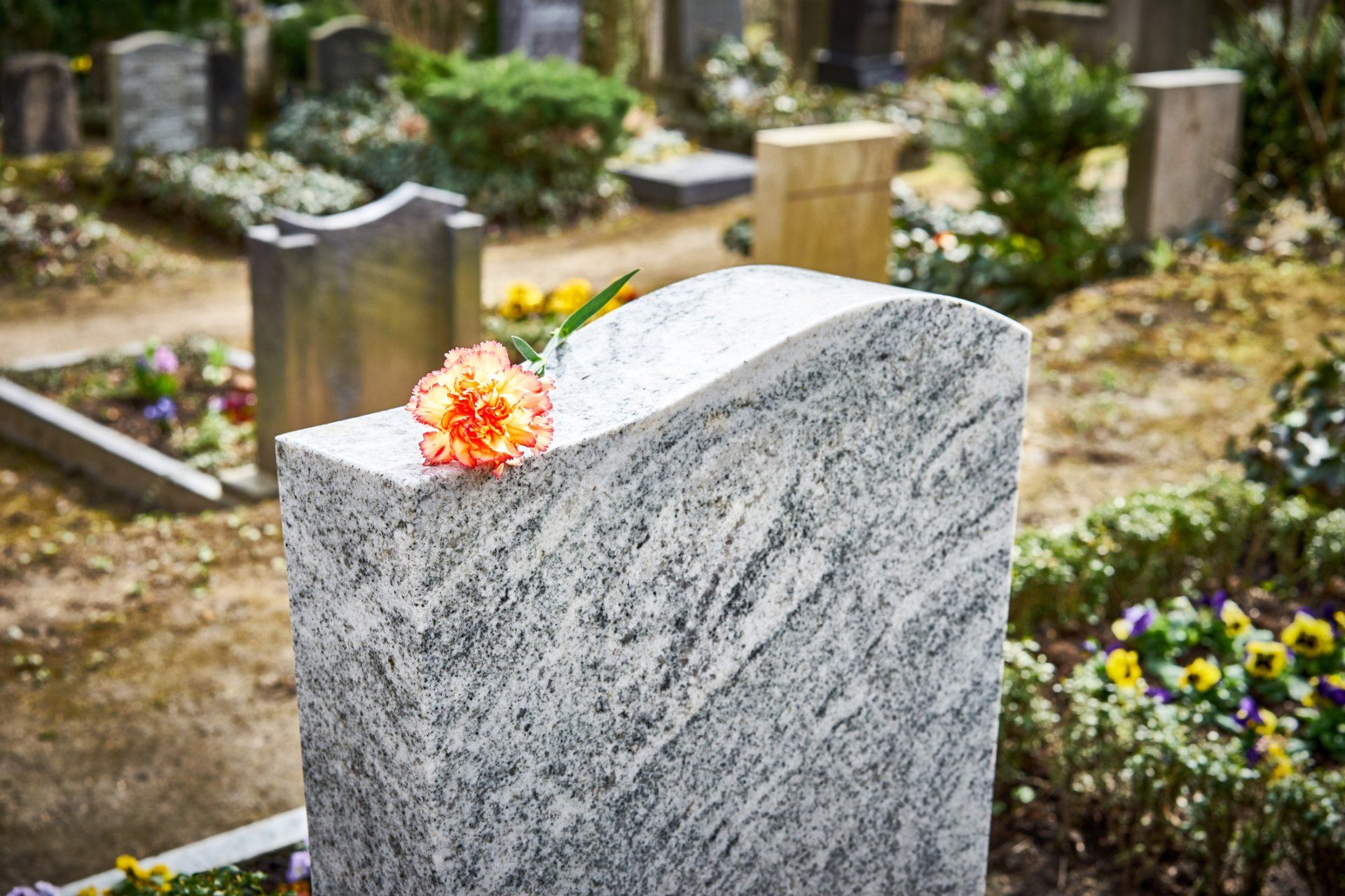 Flower On Gravestone — Hopewell, NJ — Sutphen Memorials Inc. Flower On Gravestone — Hopewell, NJ — Sutphen Memorials Inc.