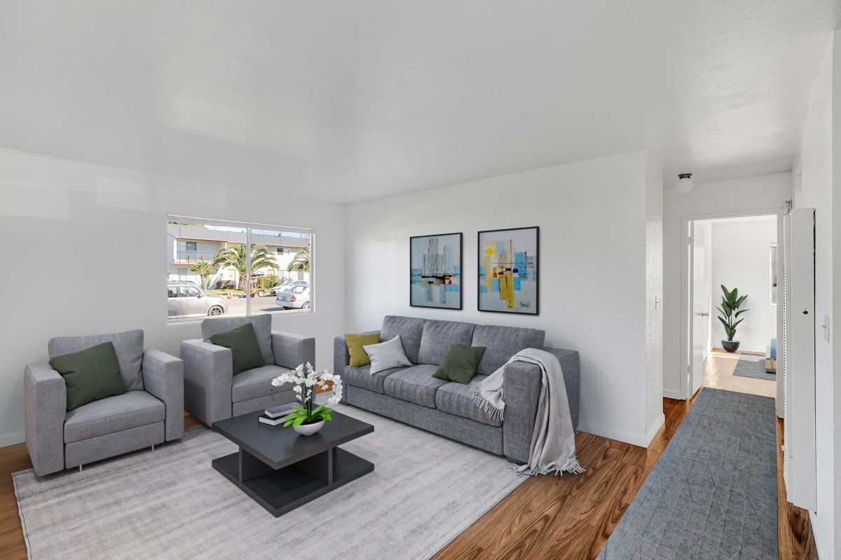 living room with couches and decor