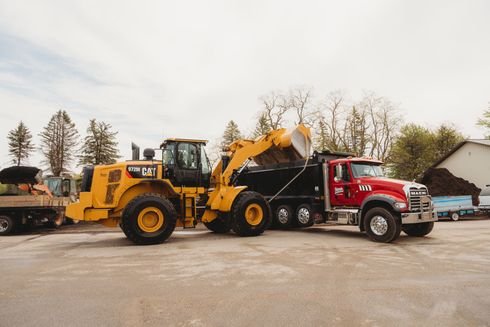 Dump truck unloading sand — North Kingsville, OH — Simak Trucking & Excavating, Inc.