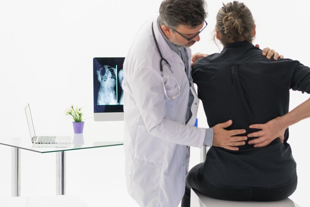 Checking The Patient — Rome, GA — Proctor-Keene Chiropractic Clinic