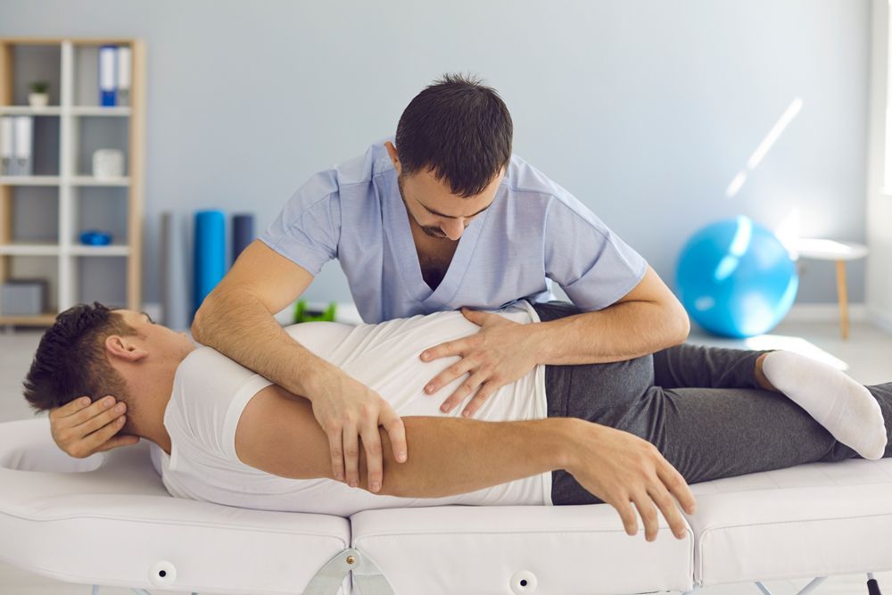 Man Having A Chiropractic Session — Rome, GA — Proctor-Keene Chiropractic Clinic