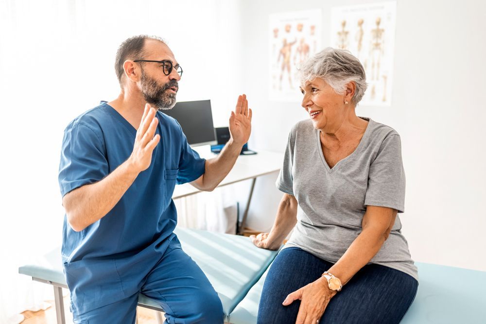 Chiropractor Explaining To The Patient — Rome, GA — Proctor-Keene Chiropractic Clinic