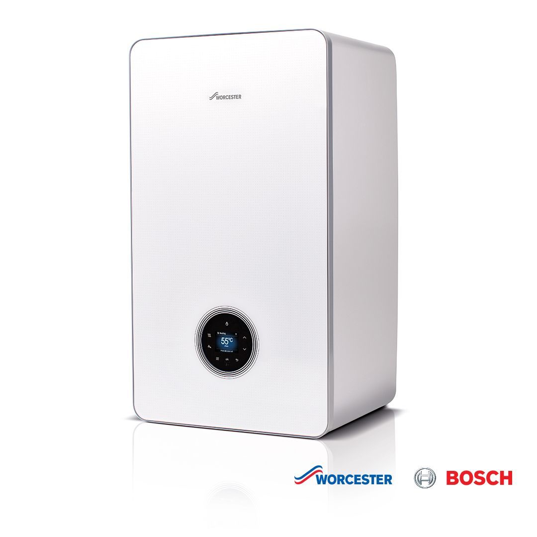 A white boiler is sitting on a white surface.