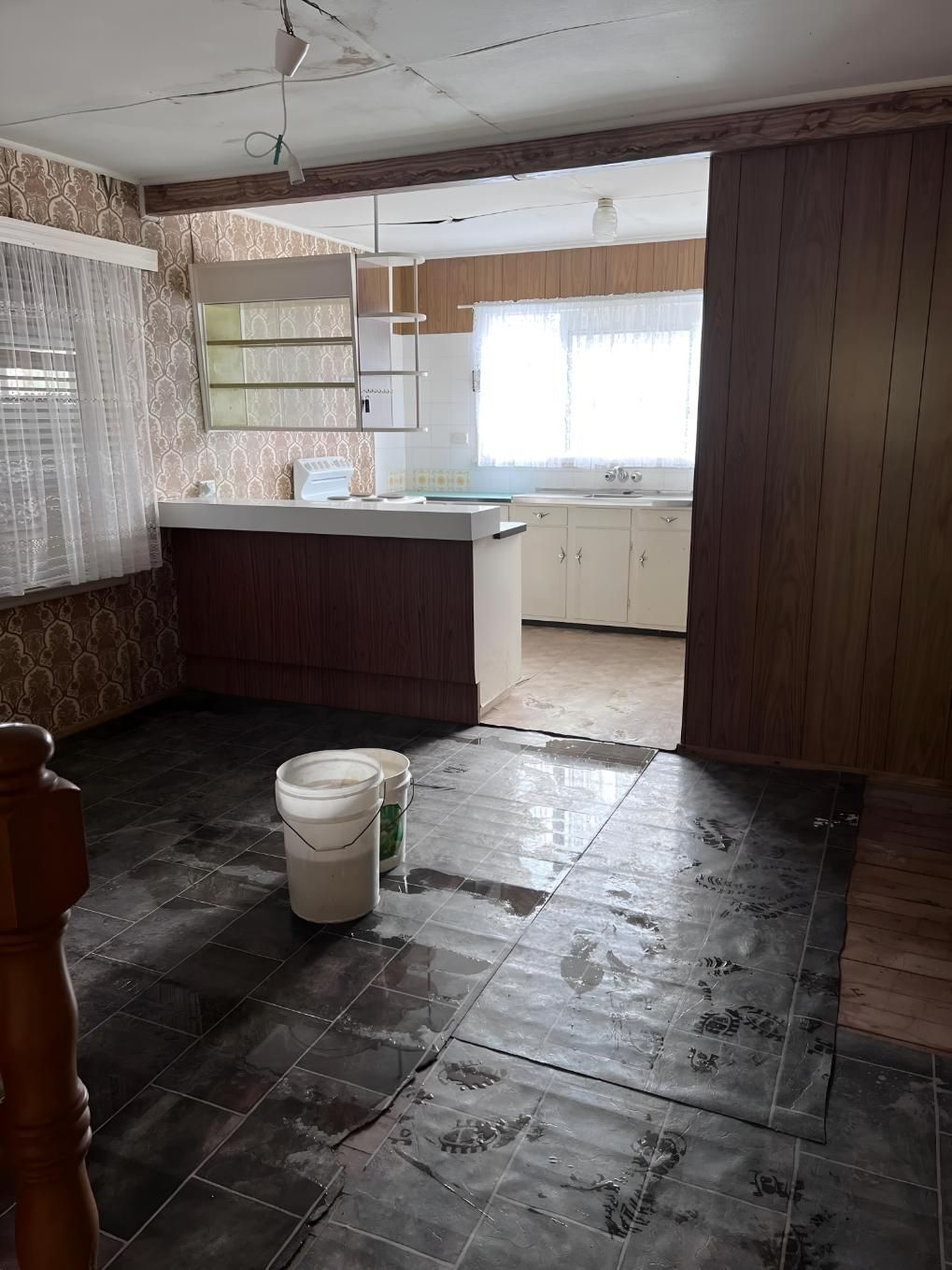 Room With Dark Floor Tiles — LD Carpentry in Moss Vale, NSW