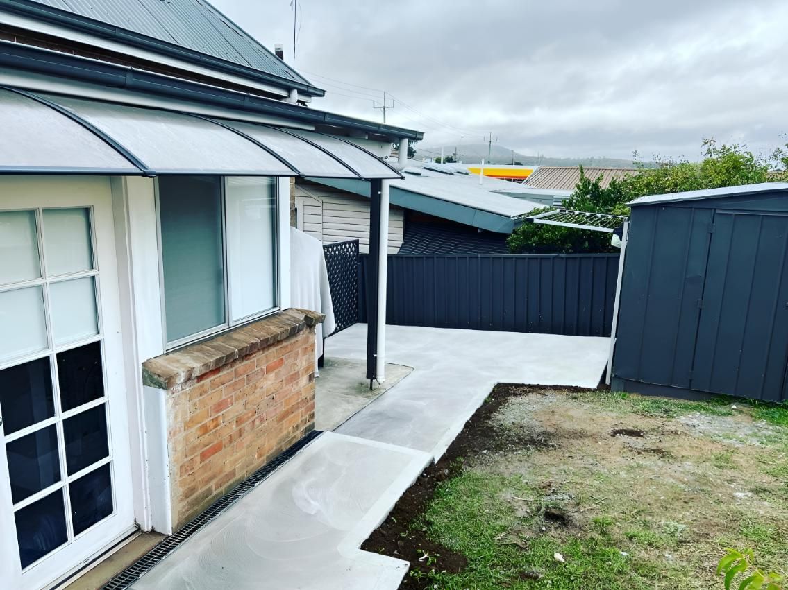 Exterior View of a House With a Concrete Path — LD Carpentry in Goulburn, NSW