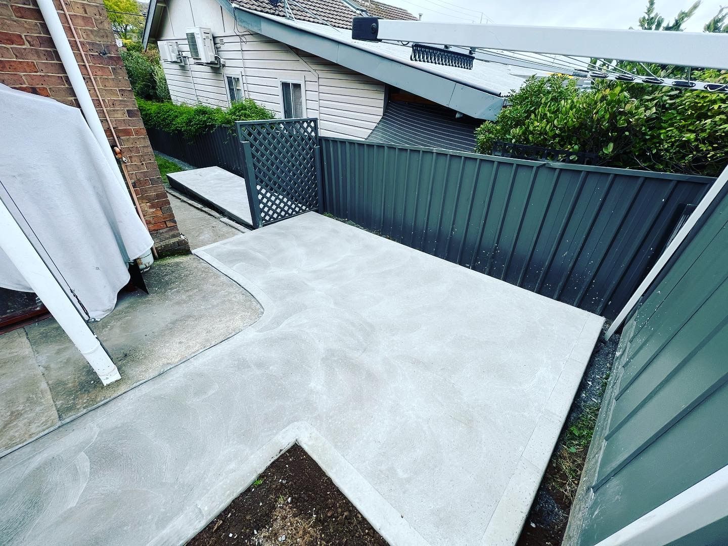 Concreting around. house — LD Carpentry in Goulburn, NSW