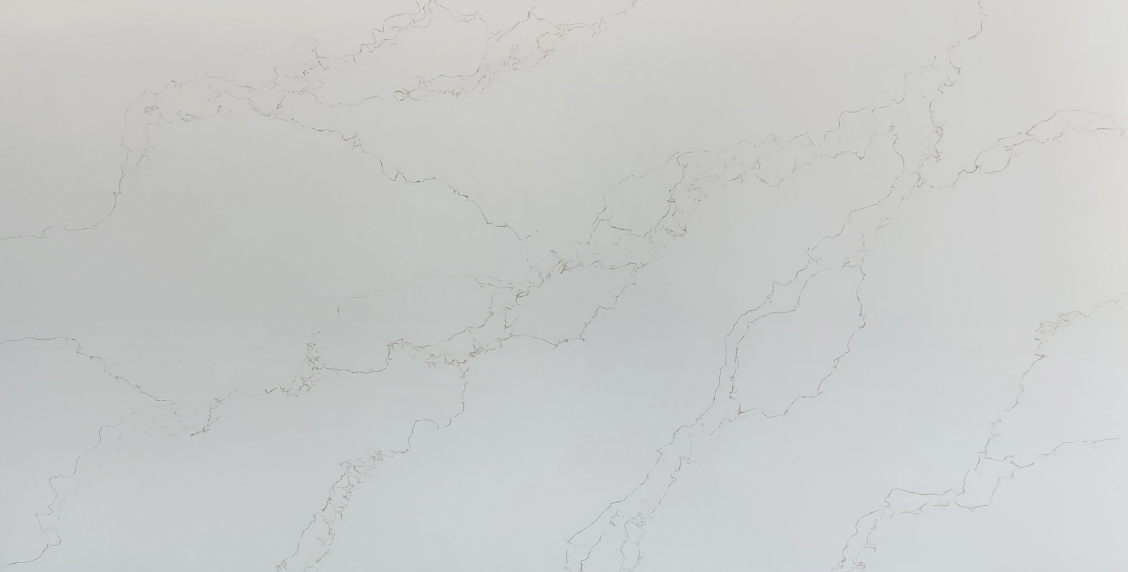 White marble surface with faint gold veining on a light background