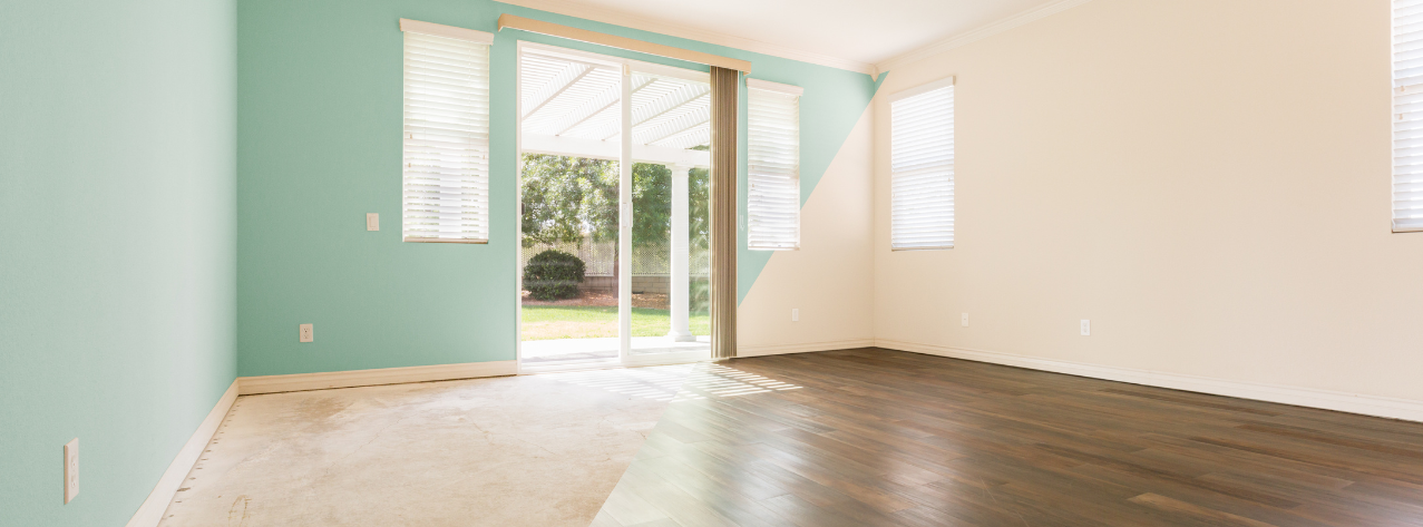 A room that has been edited to be half freshly painted and half unpainted to show comparison