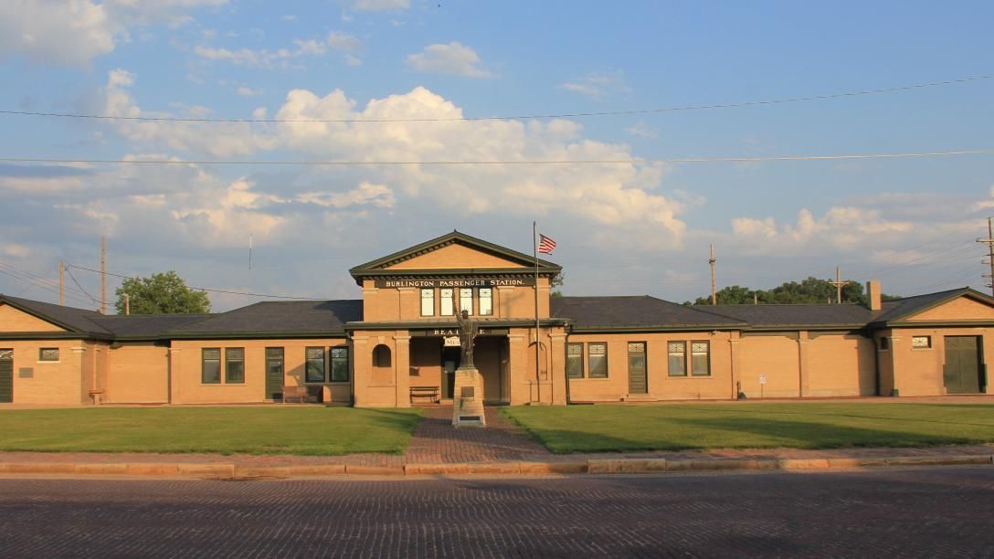 A large building with a flag on top of it