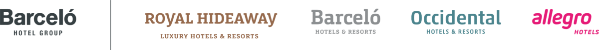 Una imagen borrosa de cuatro letras de diferentes colores sobre un fondo blanco.