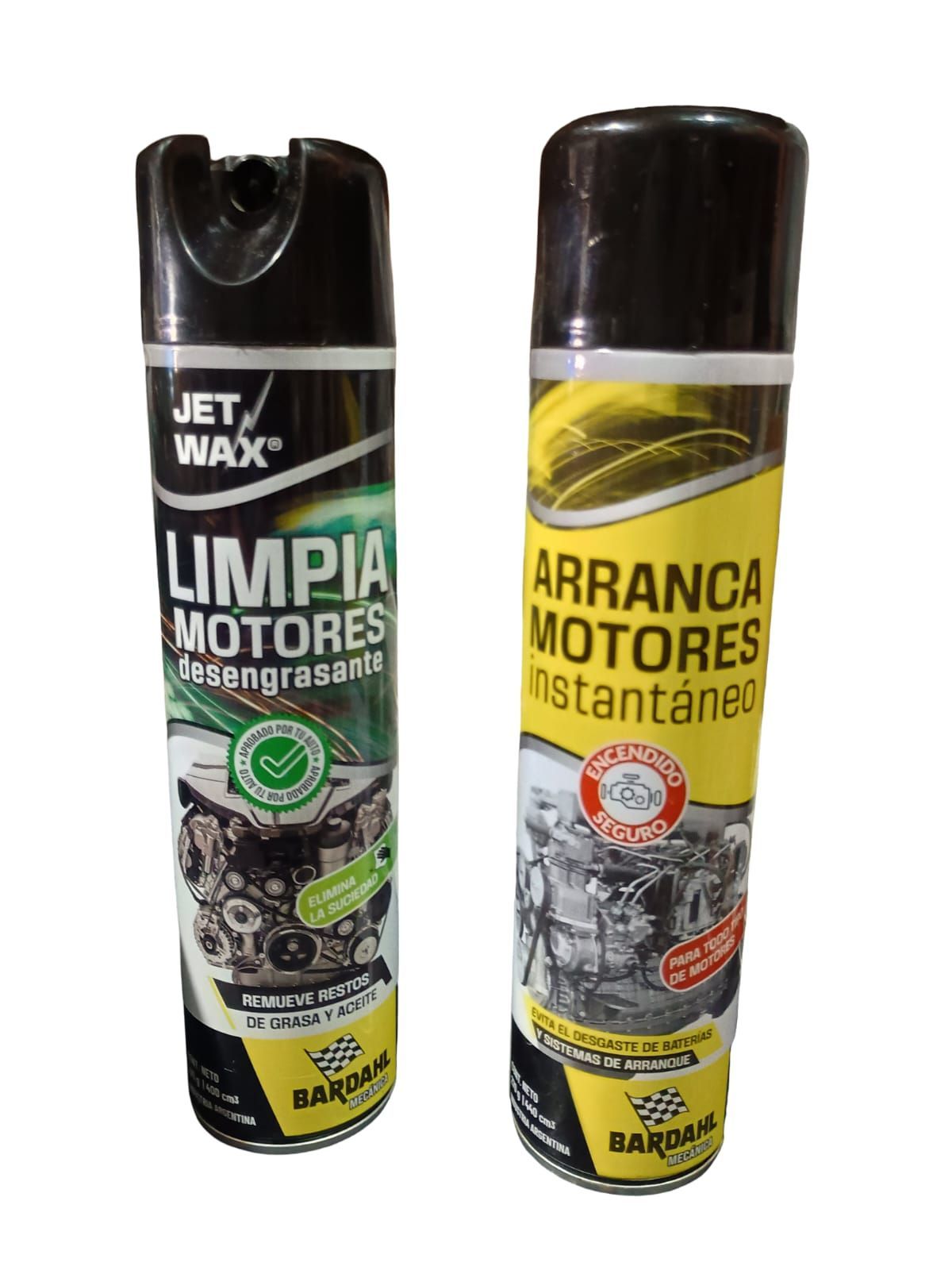 Dos latas de aerosol para la limpieza de motores, una negra y otra amarilla, etiquetadas en español.