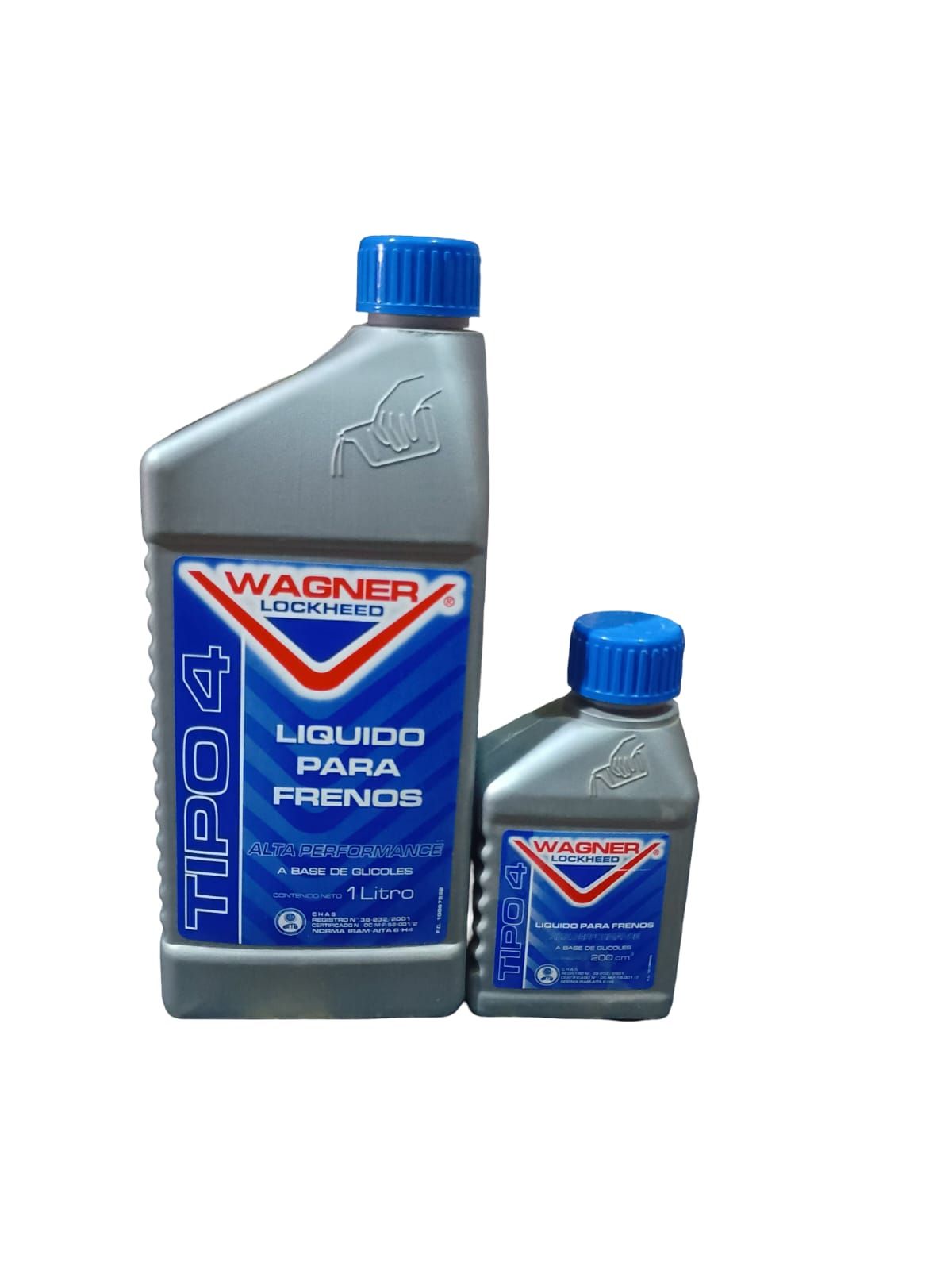 Dos botellas de líquido de frenos Wagner Tiplac con tapón azul, una grande y otra pequeña, sobre un fondo blanco.